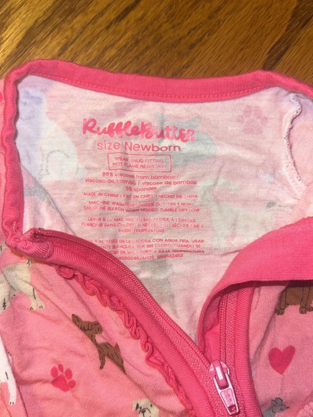 Ruffle Butts Pink Puppy Print Footed Bamboo One-Piece